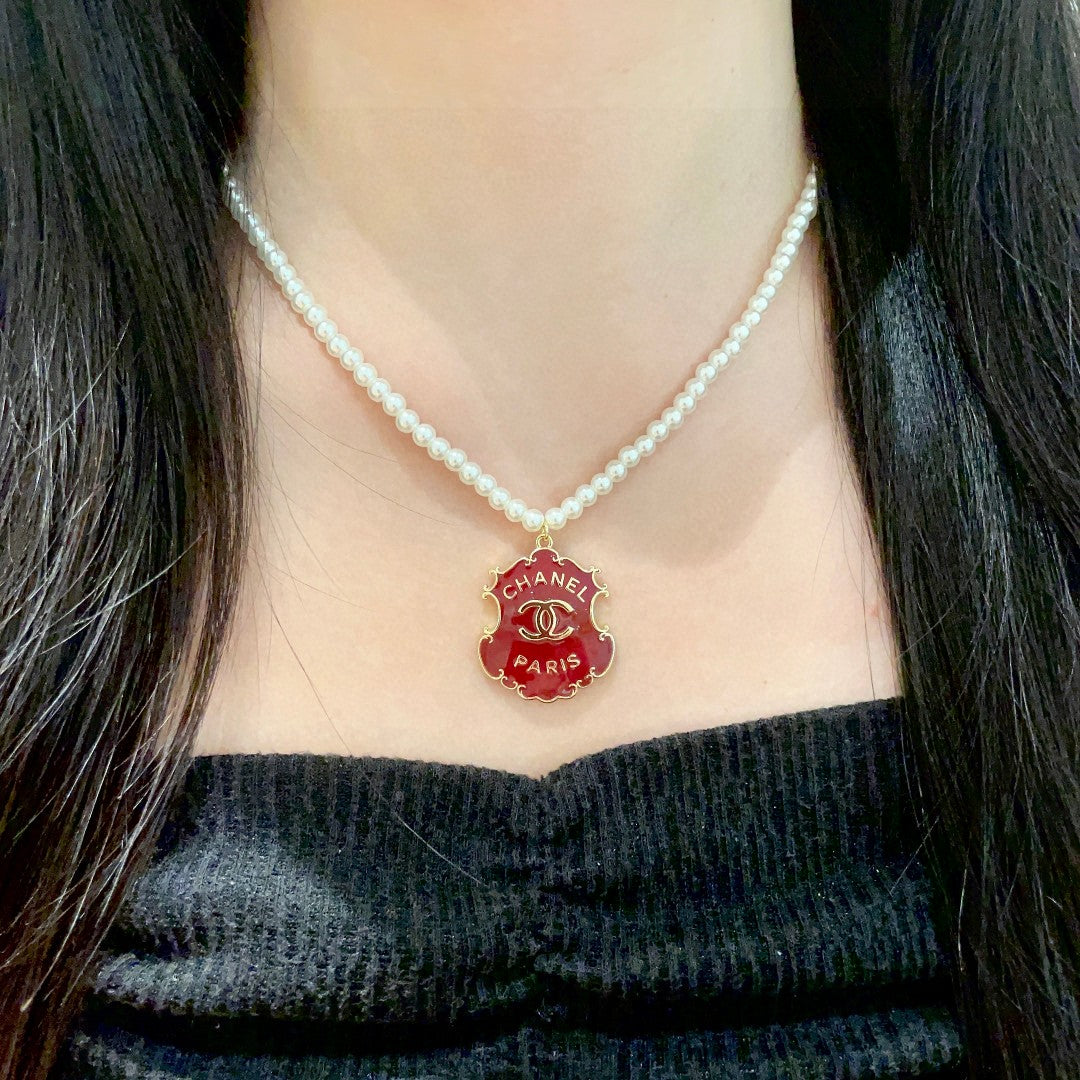 Double-C Emblem Pearl-Detail Pendant Necklace – Pearl Detail – Design 032 detail view