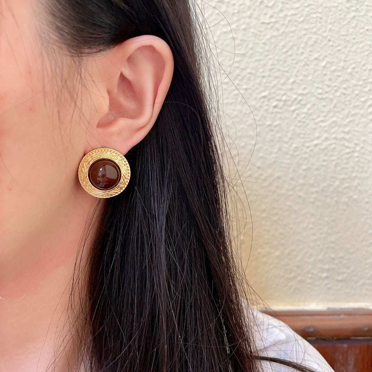 Double-C Emblem Stud Earrings in Polished Metal-Tone – Design 142 detail view