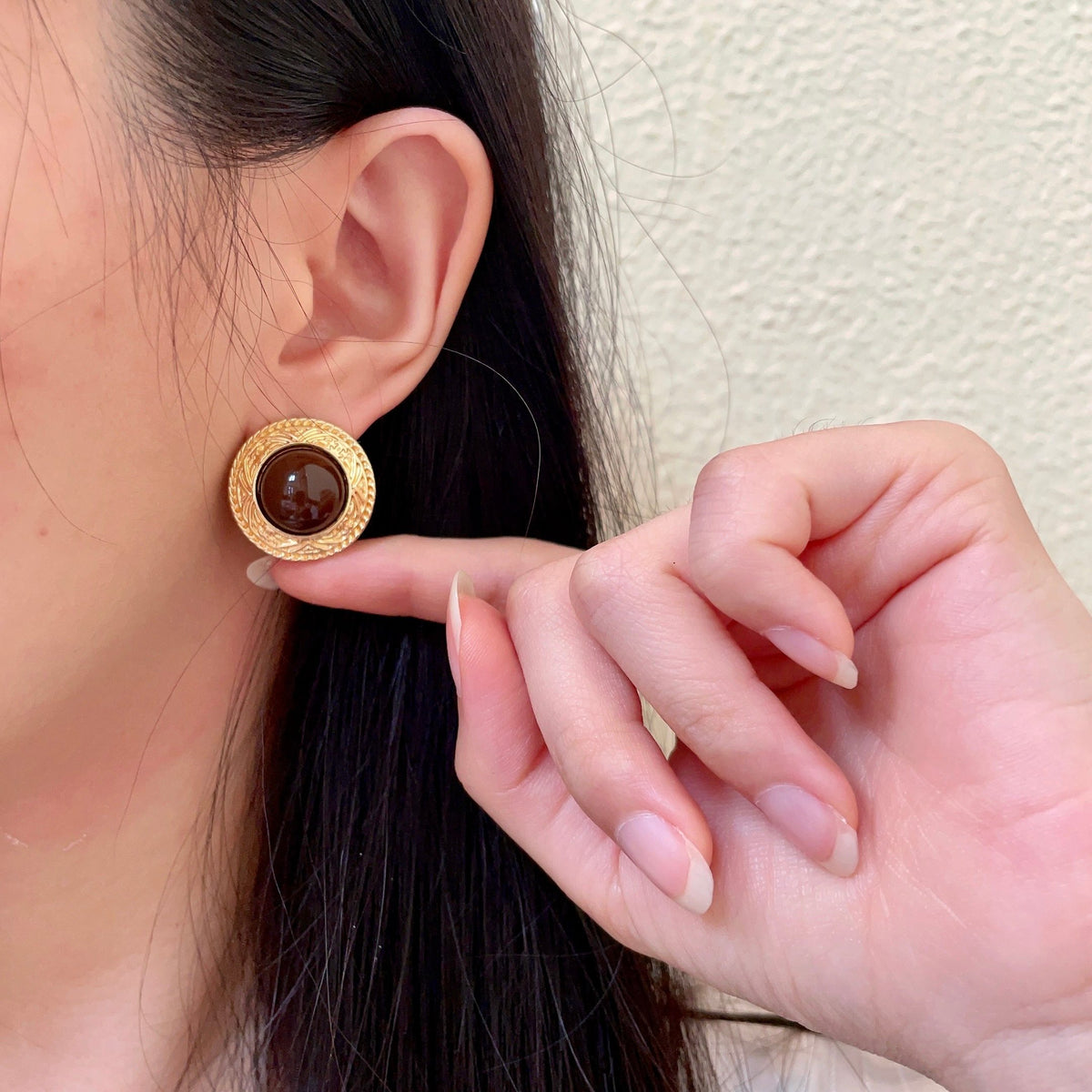 Double-C Emblem Stud Earrings in Polished Metal-Tone – Design 142 front product view