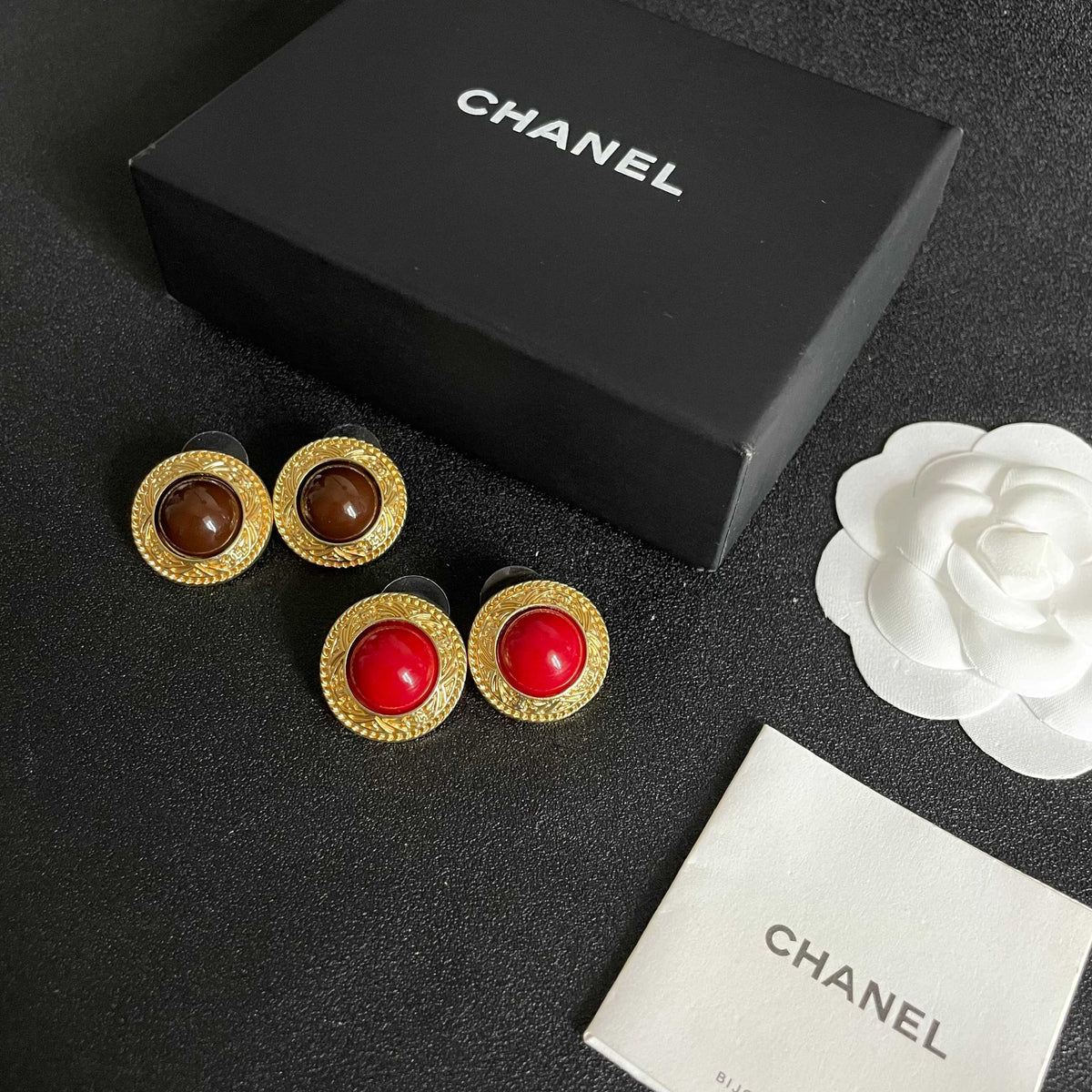 Double-C Emblem Stud Earrings in Polished Metal-Tone – Design 141 close-up detail