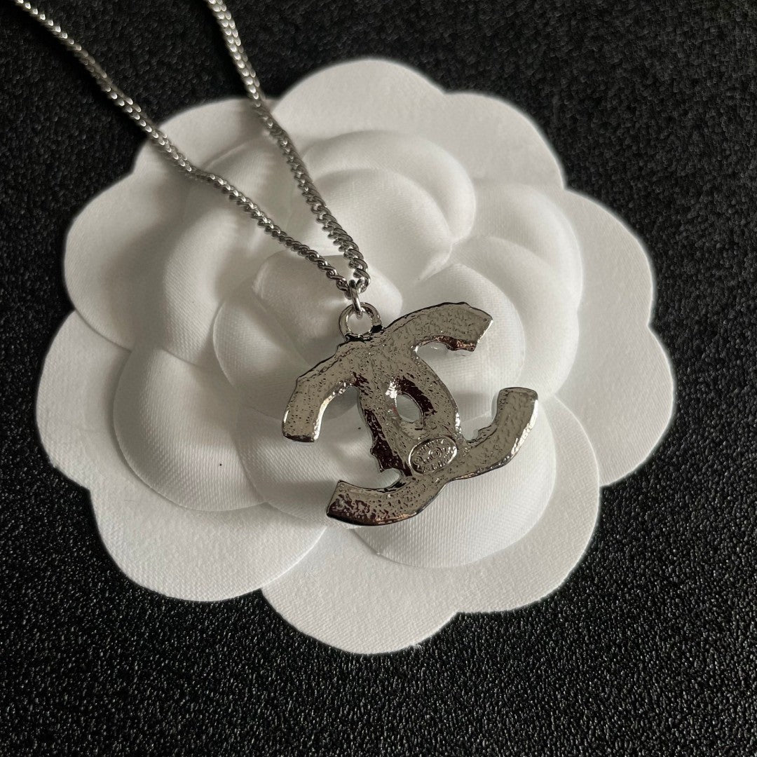 Double-C Emblem Pendant Necklace in Polished Metal-Tone – Design 007 front product view
