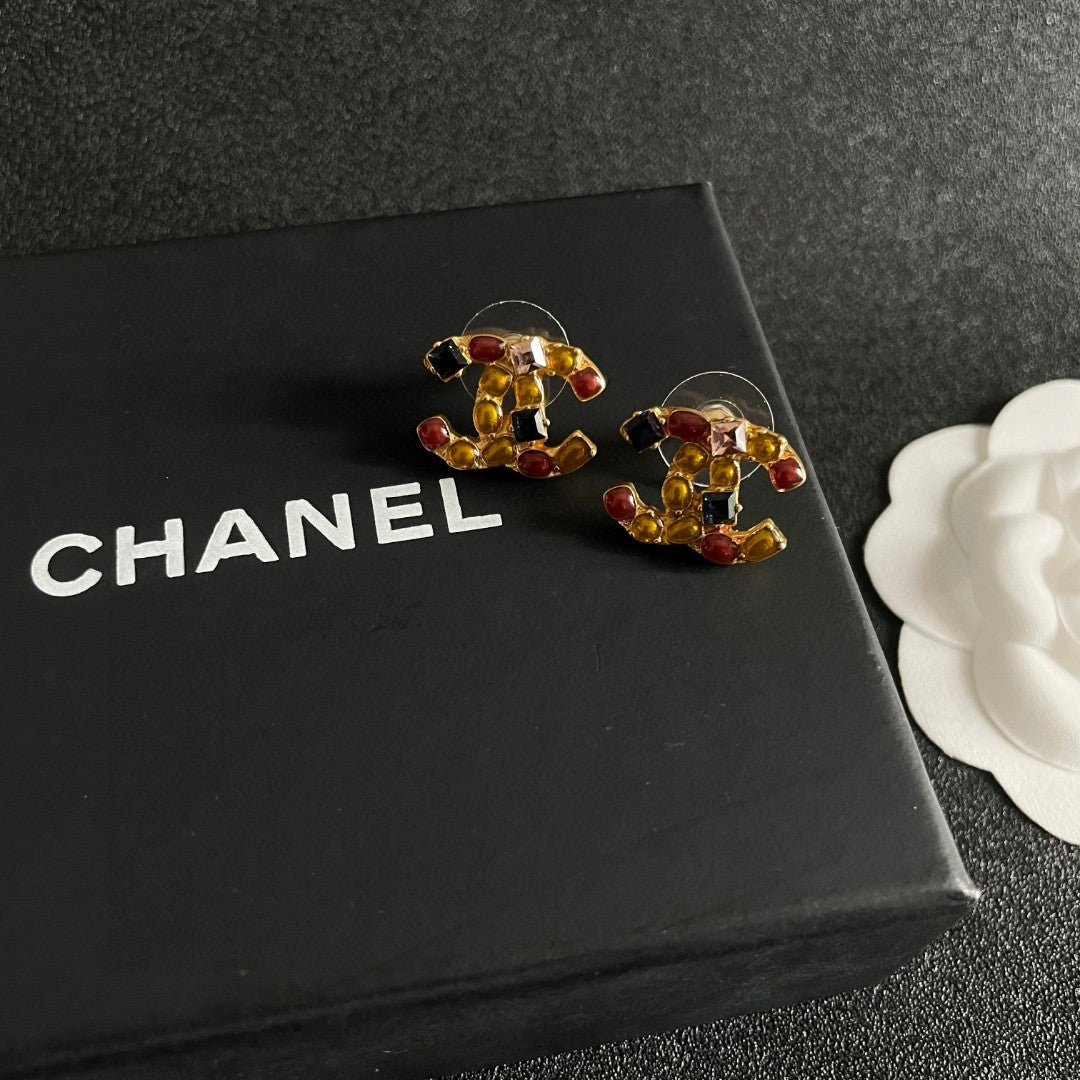 Double-C Emblem Stud Earrings in Polished Metal-Tone – Design 429 front product view
