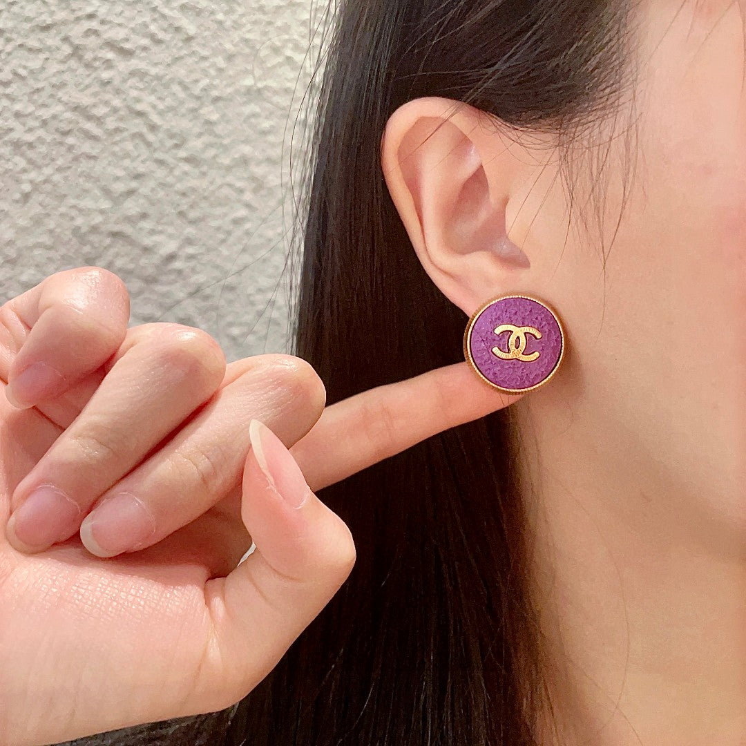 Double-C Emblem Stud Earrings in Polished Metal-Tone – Design 211 front product view