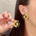 Double-C Emblem Stud Earrings in Polished Metal-Tone – Design 179 main product view