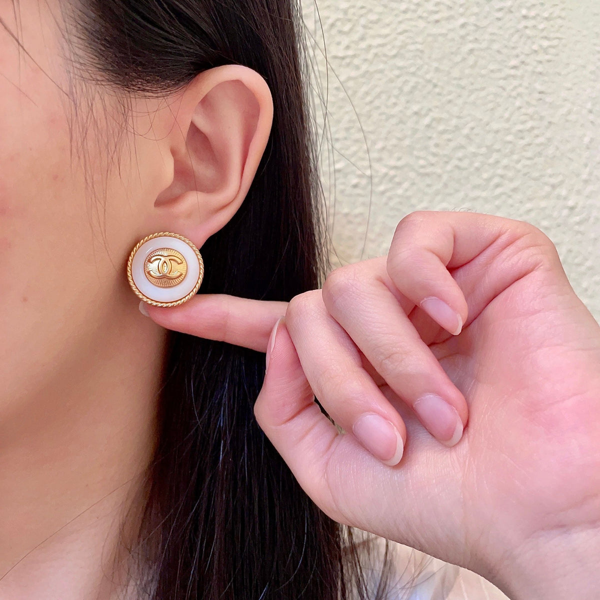 Double-C Emblem Stud Earrings in Polished Metal-Tone – Design 210 front product view
