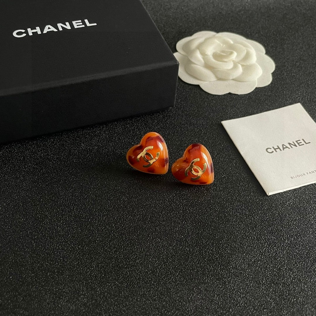 Double-C Emblem Stud Earrings in Polished Metal-Tone – Heart Detail – Design 013 styled product view
