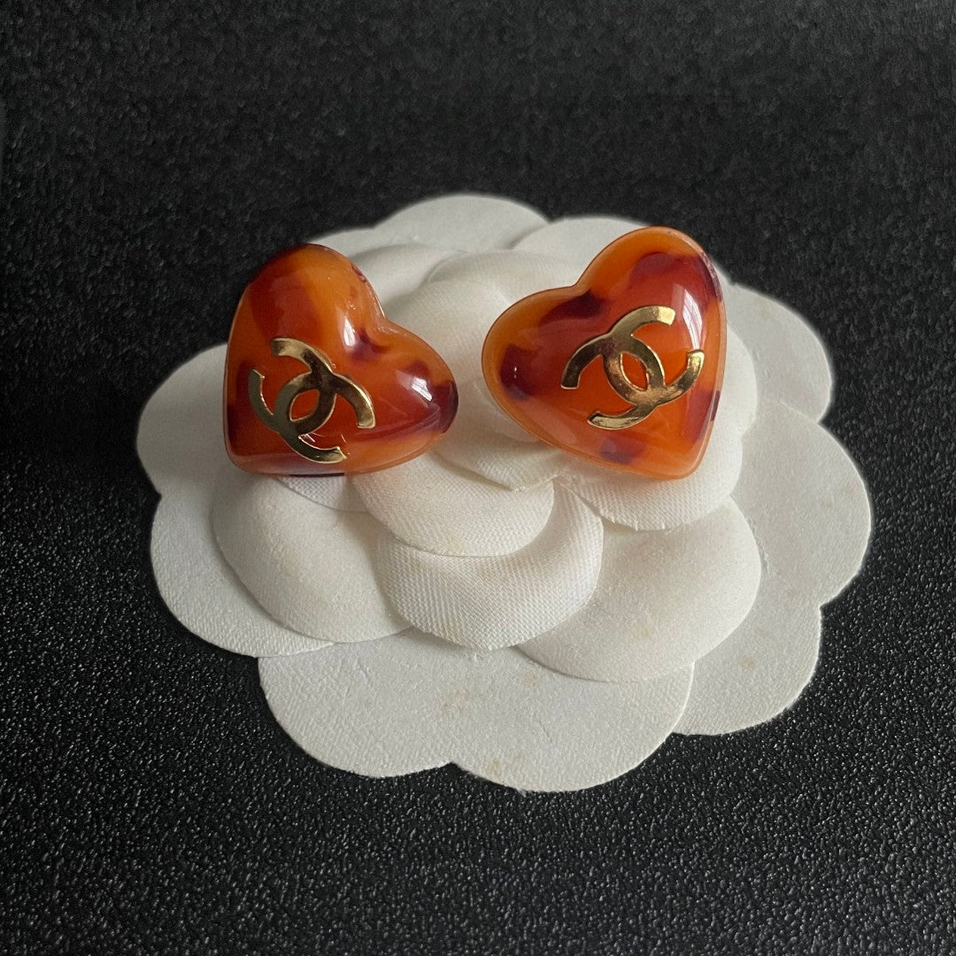 Double-C Emblem Stud Earrings in Polished Metal-Tone – Heart Detail front product view