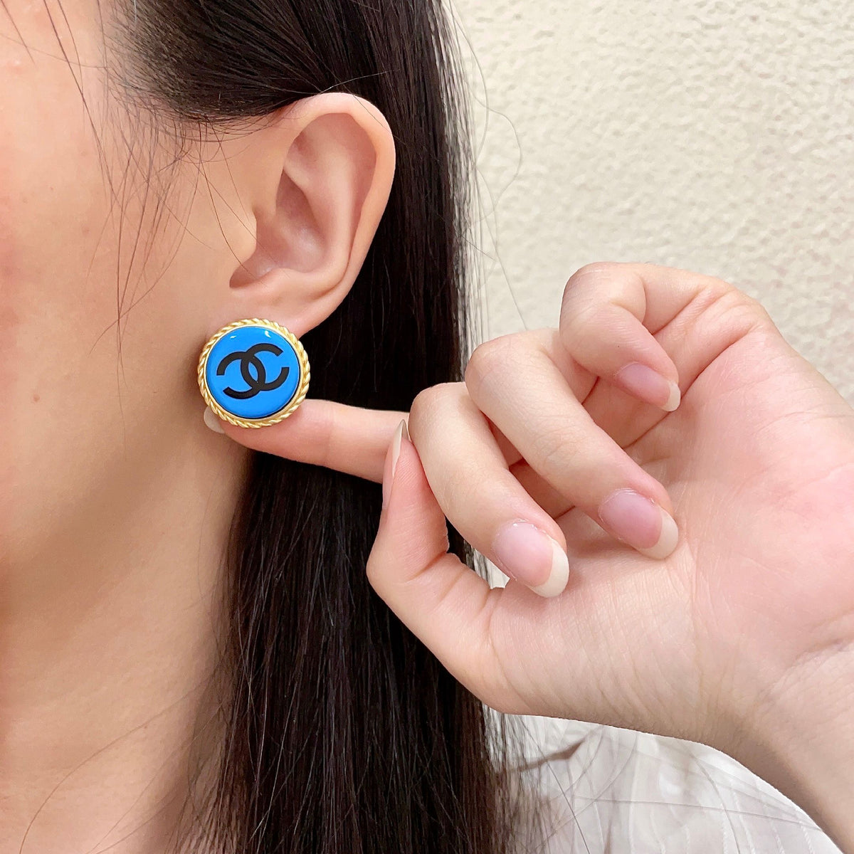 Double-C Emblem Stud Earrings in Polished Metal-Tone – Design 216 front product view