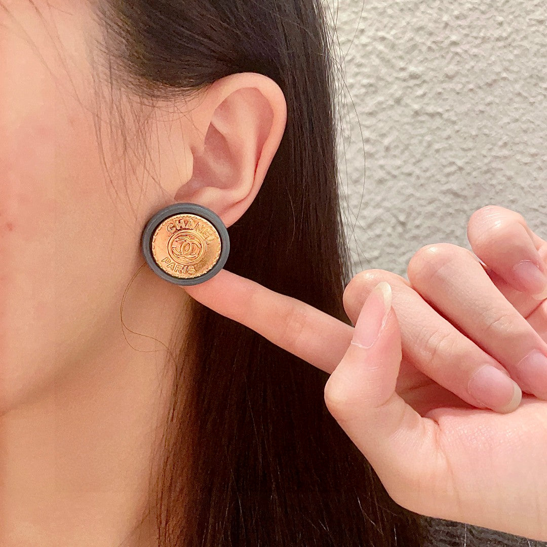 Double-C Emblem Stud Earrings in Polished Metal-Tone – Design 279 front product view