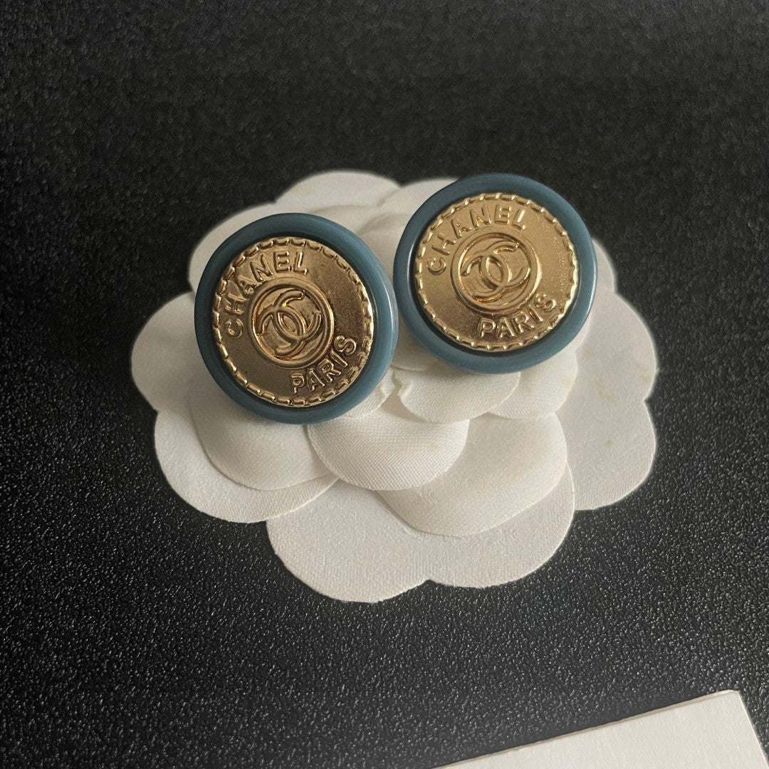 Double-C Emblem Stud Earrings in Polished Metal-Tone – Design 237 front product view