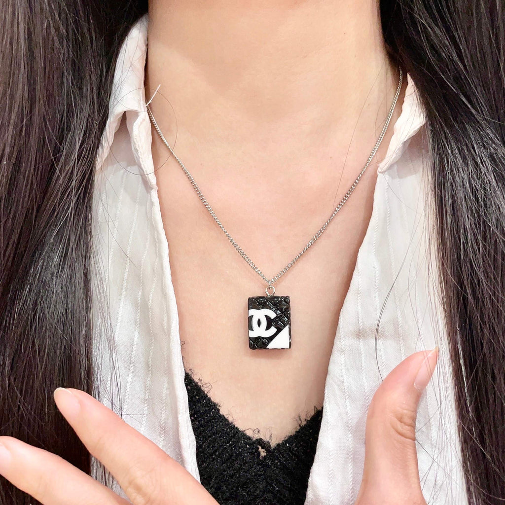 Double-C Emblem Pendant Necklace in Polished Metal-Tone – Design 042 front product view