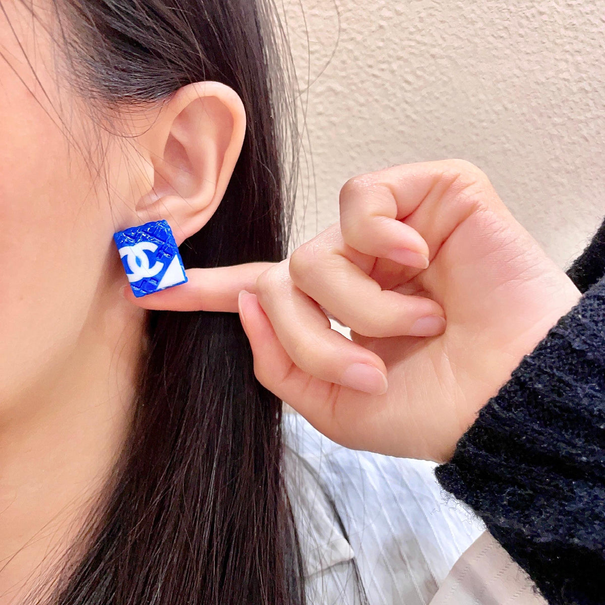 Double-C Emblem Stud Earrings in Polished Metal-Tone – Design 272 front product view