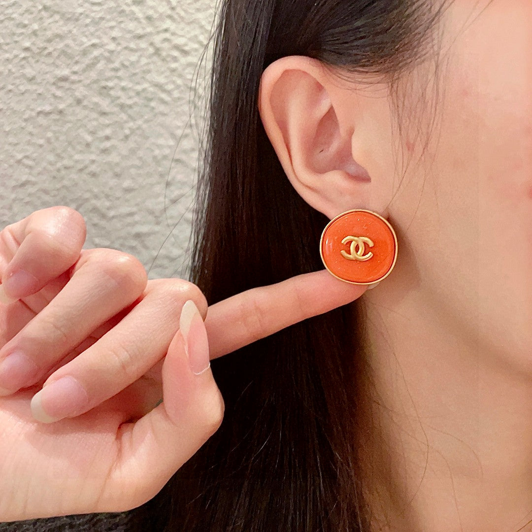 Double-C Emblem Stud Earrings in Polished Metal-Tone – Design 270 front product view