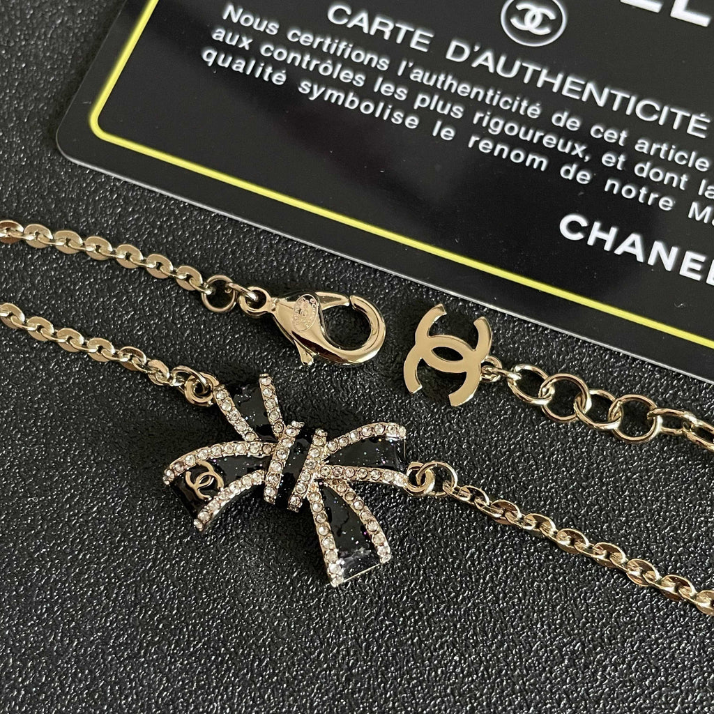 Double-C Emblem Bracelet in Polished Metal-Tone – Design 007 front product view