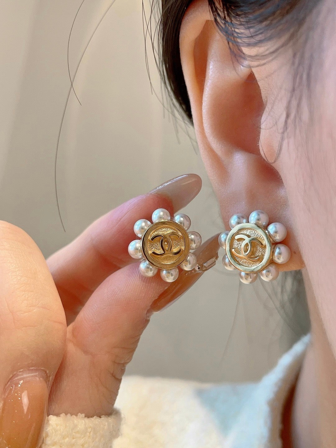 Double-C Emblem Stud Earrings in Polished Metal-Tone – Design 299 front product view