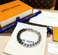 Signature Emblem Bracelet in Polished Metal-Tone – Black Detail main product view