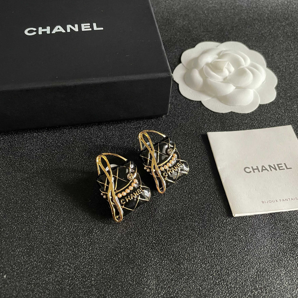 Double-C Emblem Stud Earrings in Polished Metal-Tone – Design 337 styled product view