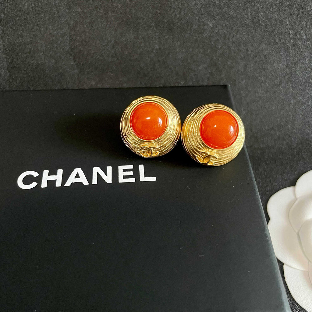 Double-C Emblem Stud Earrings in Polished Metal-Tone – Design 282 detail view