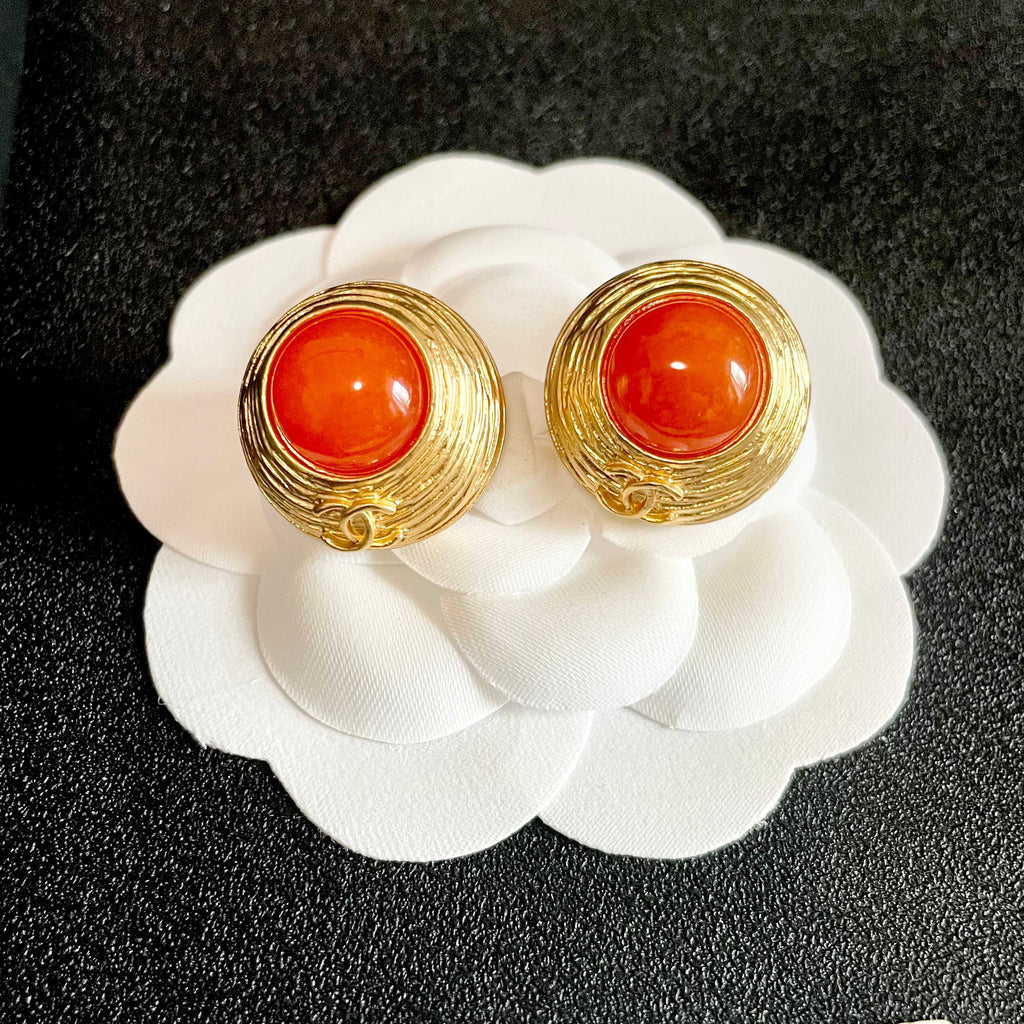 Double-C Emblem Stud Earrings in Polished Metal-Tone – Design 282 front product view