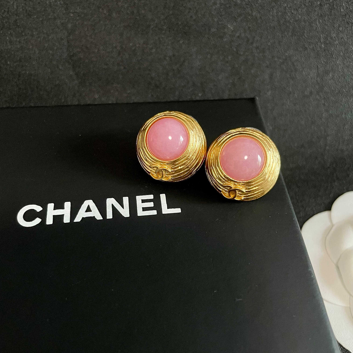 Double-C Emblem Stud Earrings in Polished Metal-Tone – Design 342 detail view