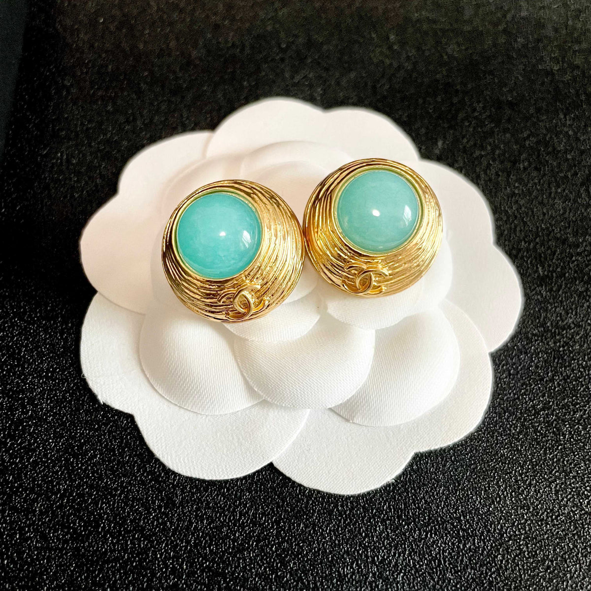 Double-C Emblem Stud Earrings in Polished Metal-Tone – Design 280 front product view