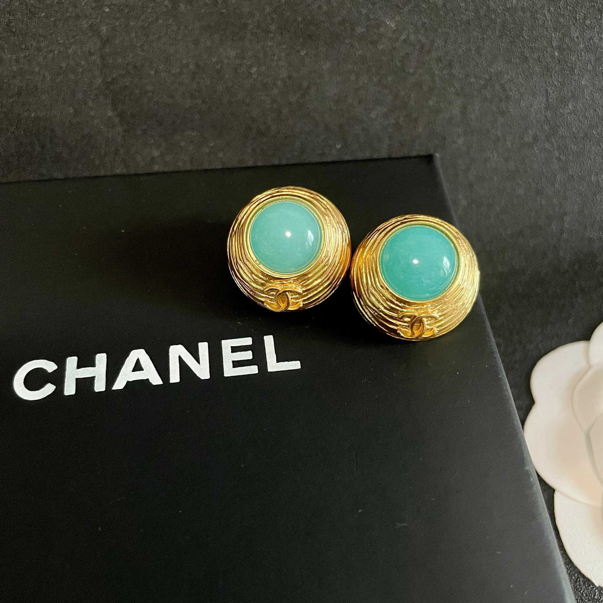 Double-C Emblem Stud Earrings in Polished Metal-Tone – Design 280 detail view