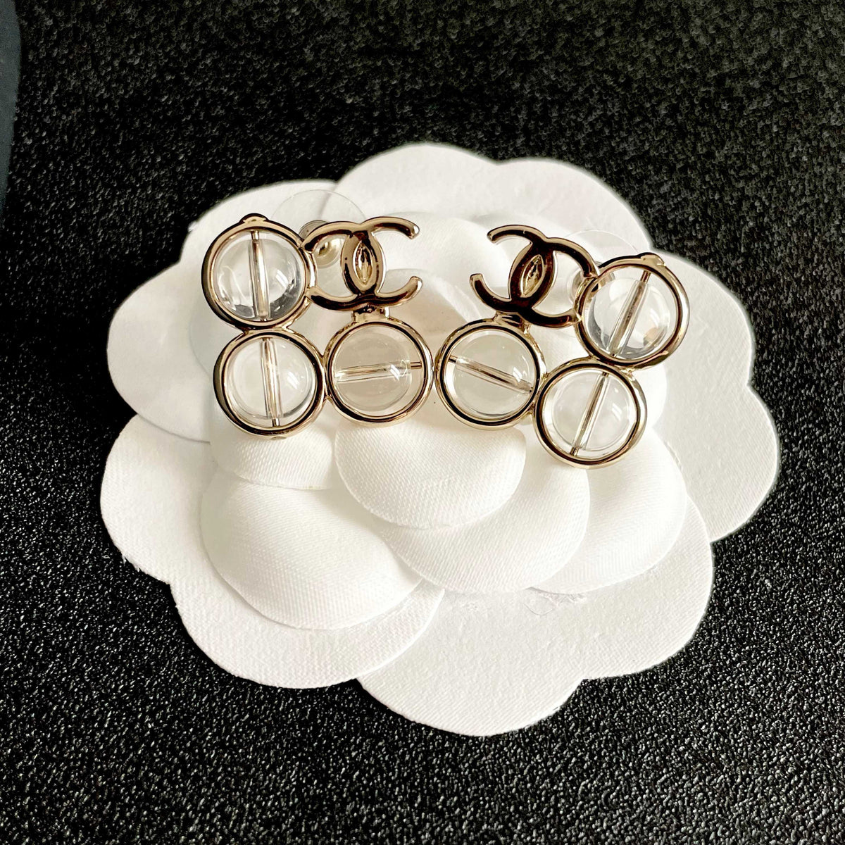 Double-C Emblem Stud Earrings in Polished Metal-Tone – Design 183 front product view