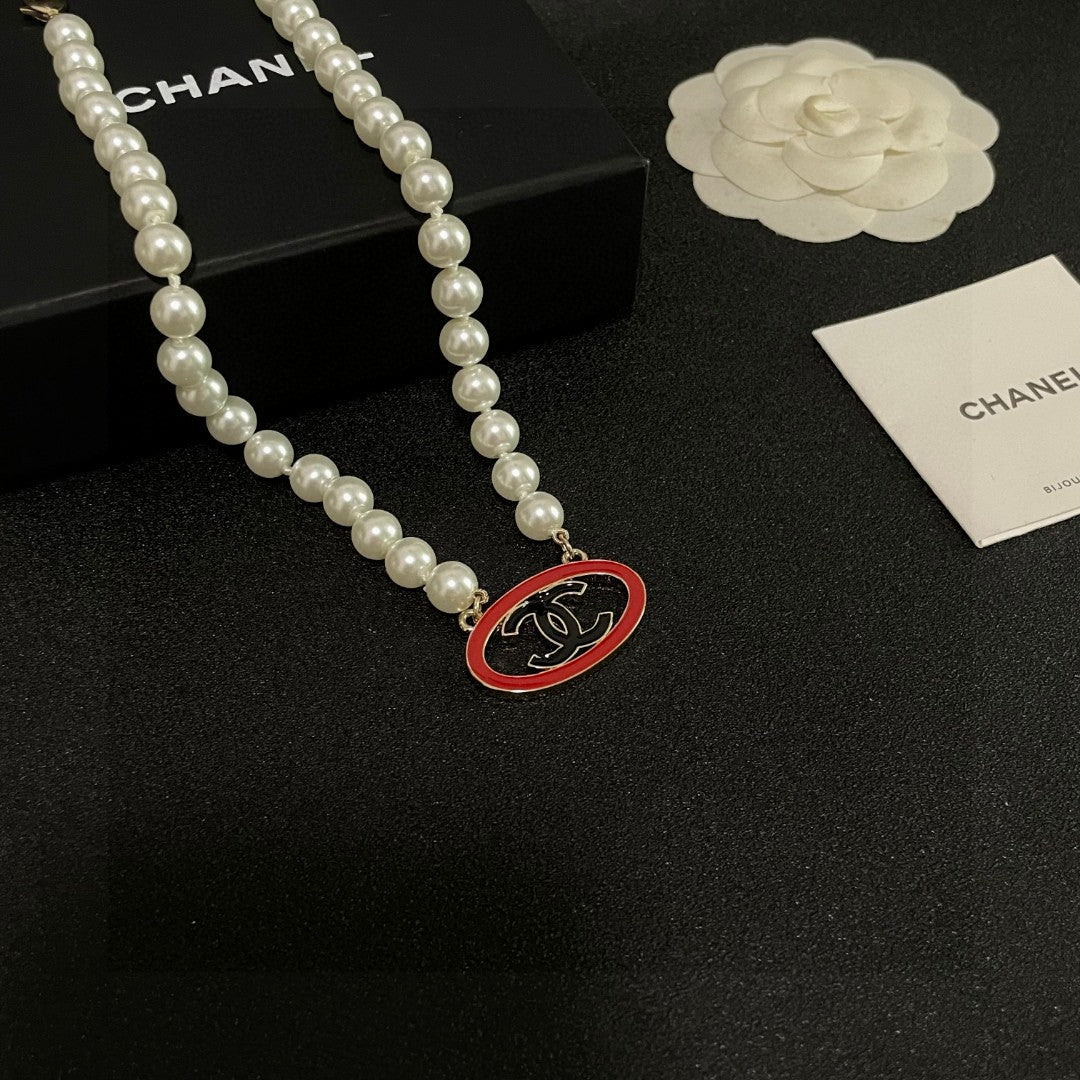 Double-C Emblem Pearl-Detail Pendant Necklace – Pearl Detail – Design 121 front product view
