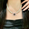 Double-C Emblem Pearl-Detail Pendant Necklace – Pearl Detail – Design 120 main product view