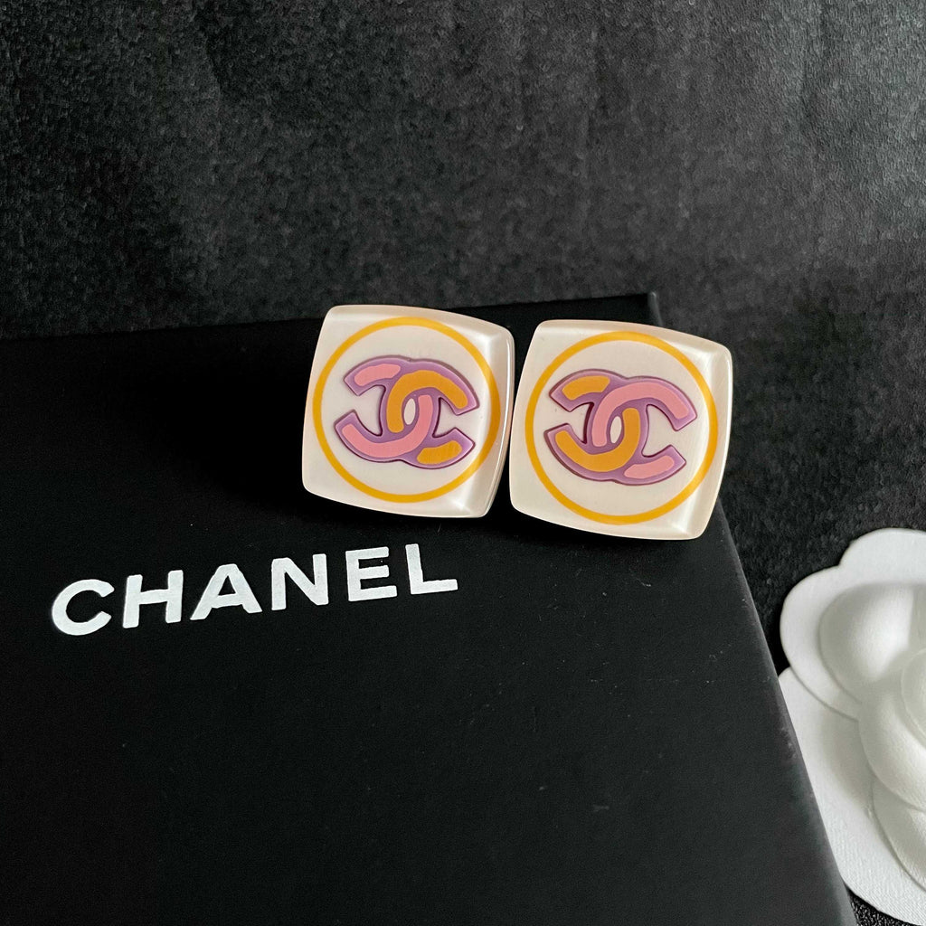 Double-C Emblem Stud Earrings in Polished Metal-Tone – Design 069 detail view