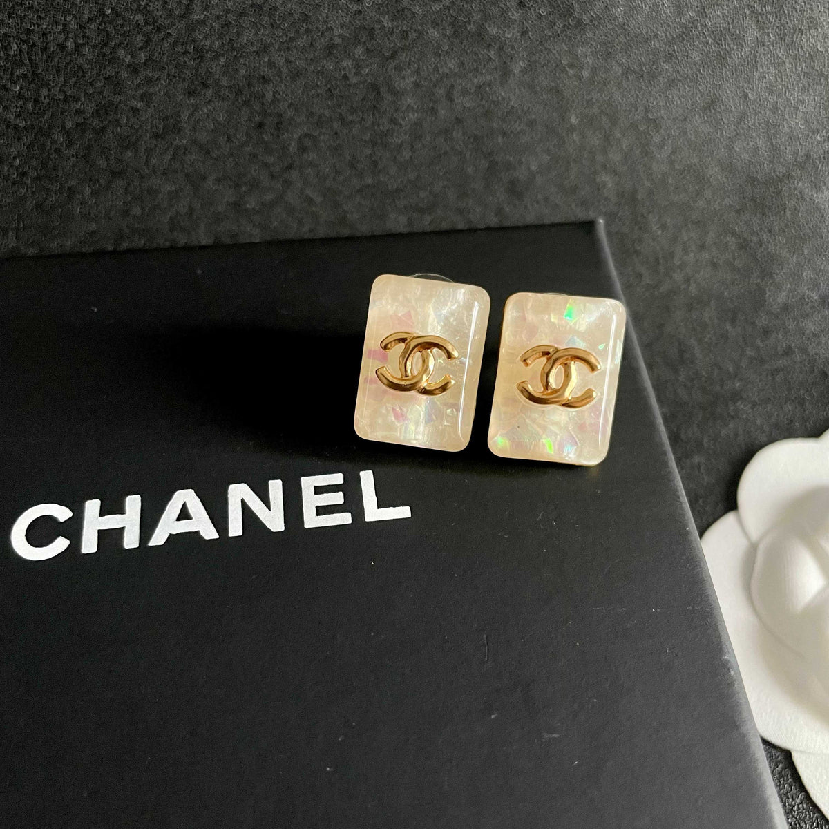 Double-C Emblem Stud Earrings in Polished Metal-Tone – Design 477 detail view