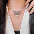 Double-C Emblem Pearl-Detail Pendant Necklace – Pearl Detail – Design 022 main product view