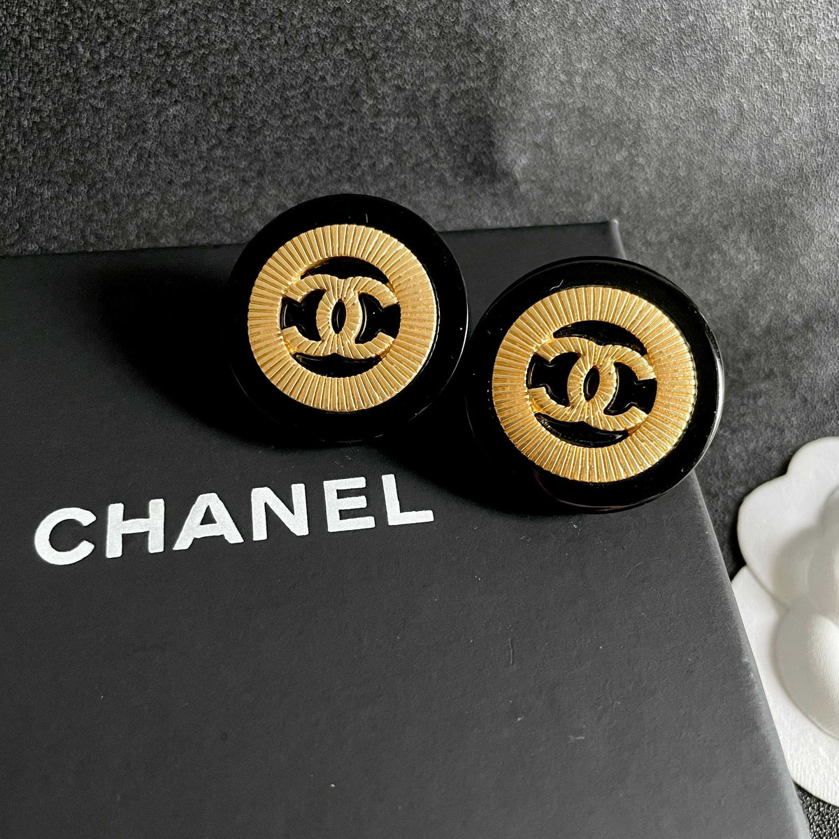 Double-C Emblem Stud Earrings in Polished Metal-Tone – Design 053 detail view