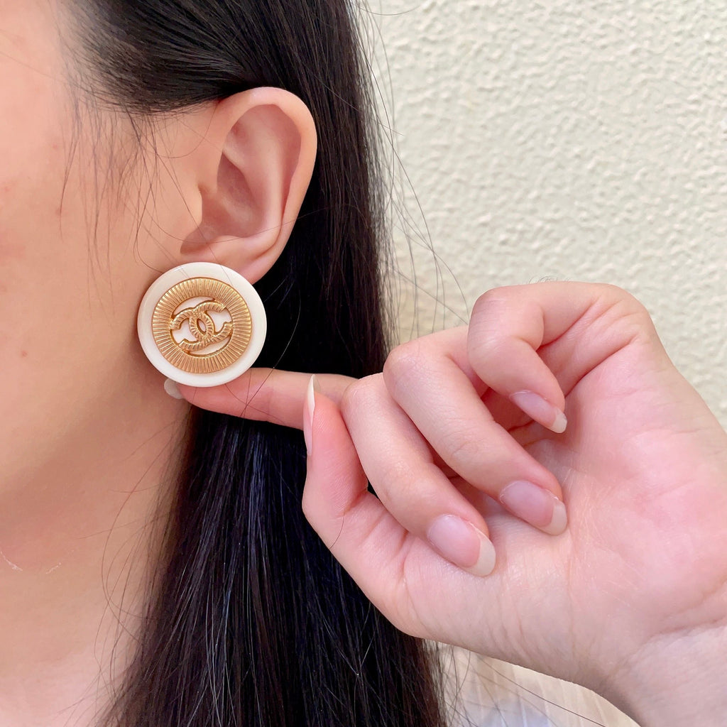 Double-C Emblem Stud Earrings in Polished Metal-Tone – Design 040 front product view
