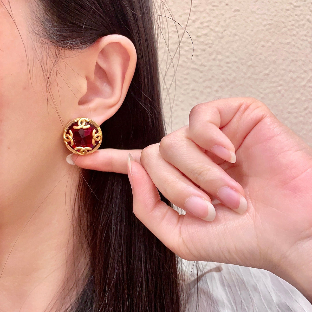 Double-C Emblem Stud Earrings in Polished Metal-Tone – Design 105 front product view