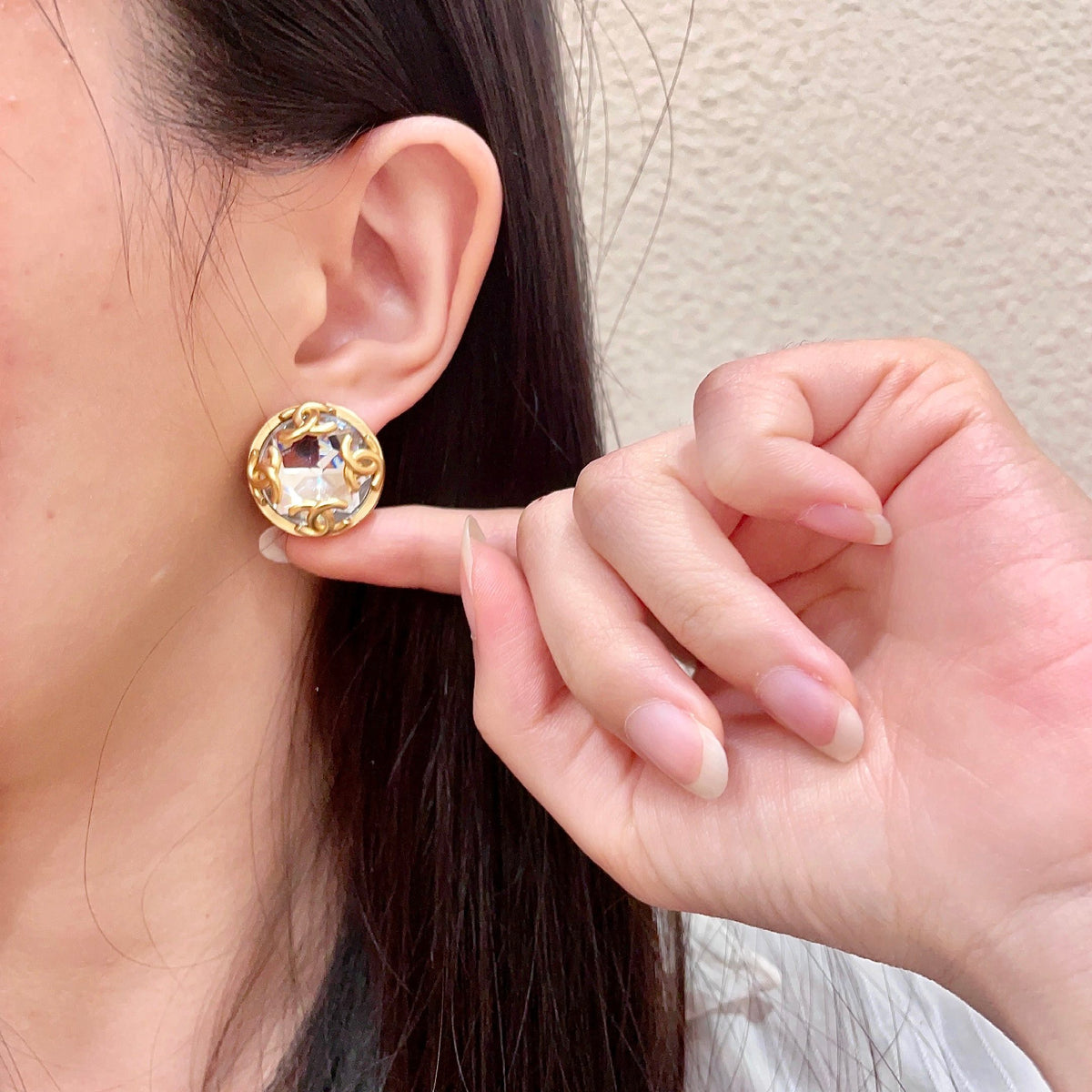 Double-C Emblem Stud Earrings in Polished Metal-Tone – Design 167 front product view