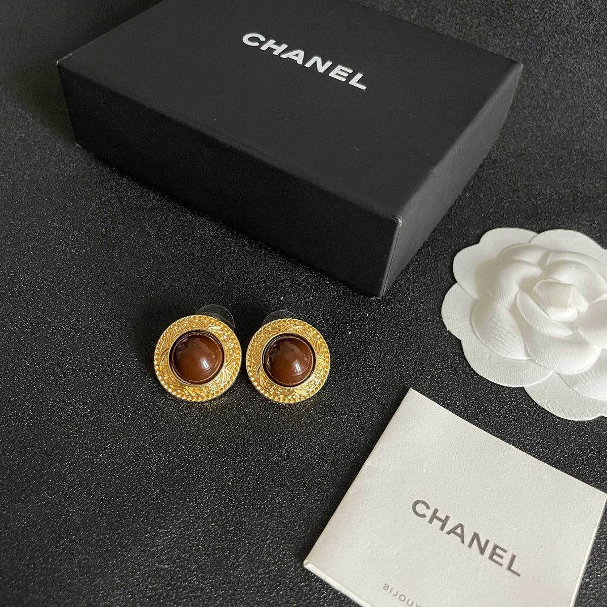 Double-C Emblem Stud Earrings in Polished Metal-Tone – Design 142 close-up detail