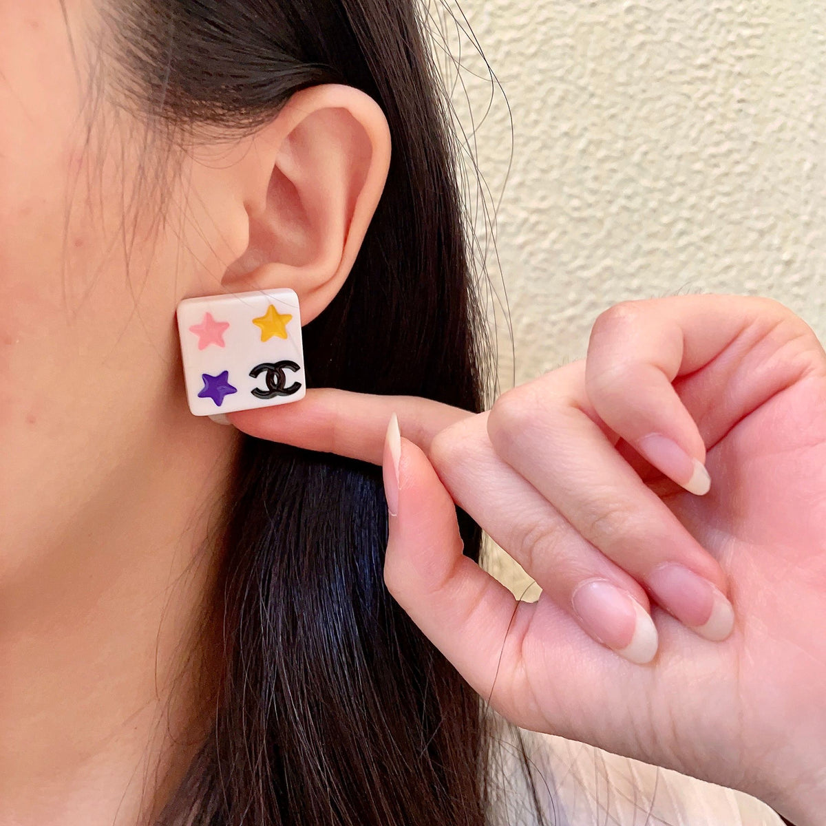 Double-C Emblem Stud Earrings in Polished Metal-Tone – Star Detail – Design 003 front product view