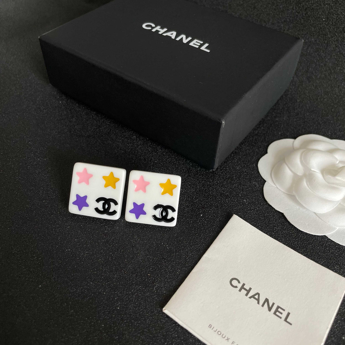 Double-C Emblem Stud Earrings in Polished Metal-Tone – Star Detail – Design 009 close-up detail