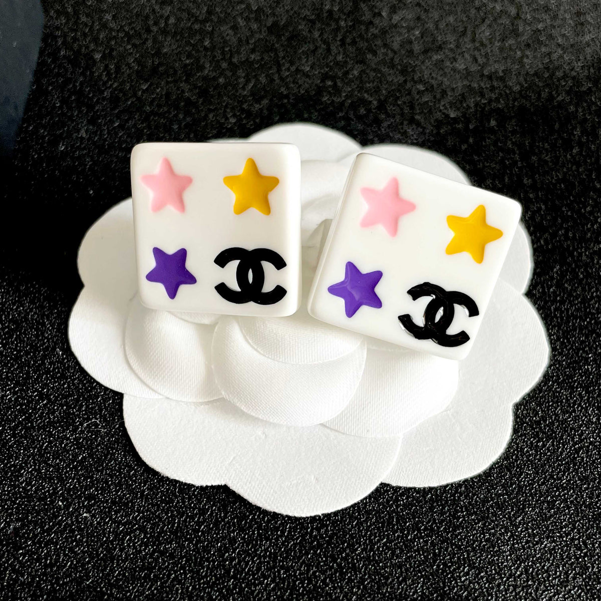 Double-C Emblem Stud Earrings in Polished Metal-Tone – Star Detail – Design 009 front product view