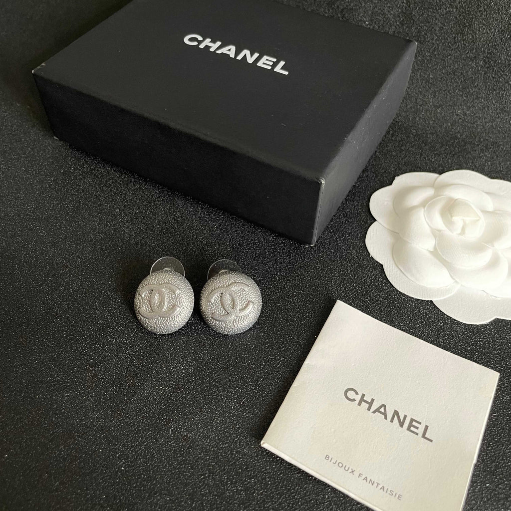 Double-C Emblem Stud Earrings in Polished Metal-Tone – Design 206 close-up detail