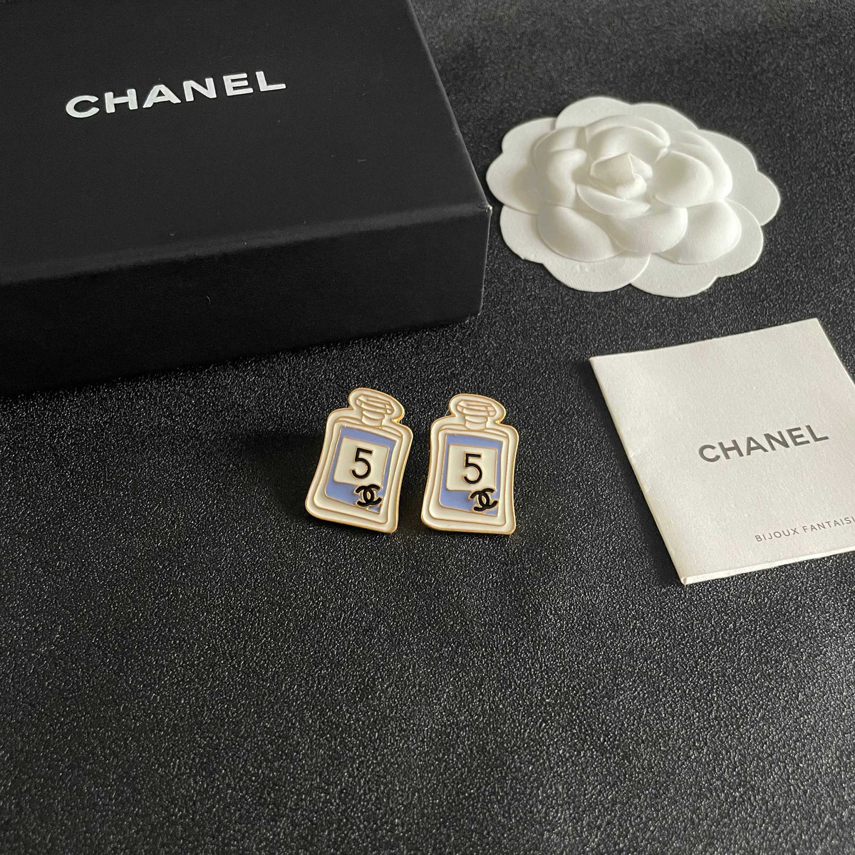Double-C Emblem Stud Earrings in Polished Metal-Tone – Design 219 styled product view