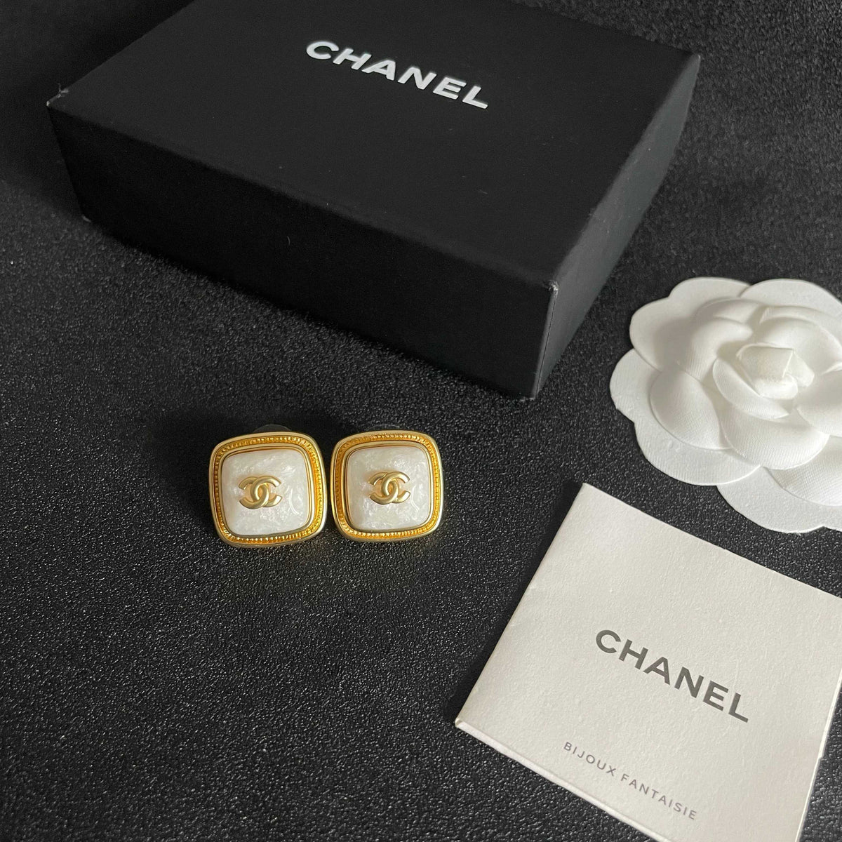 Double-C Emblem Stud Earrings in Polished Metal-Tone – Design 217 close-up detail