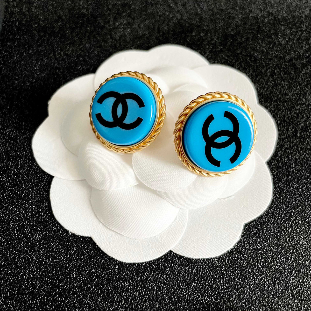 Double-C Emblem Stud Earrings in Polished Metal-Tone – Design 216 front product view