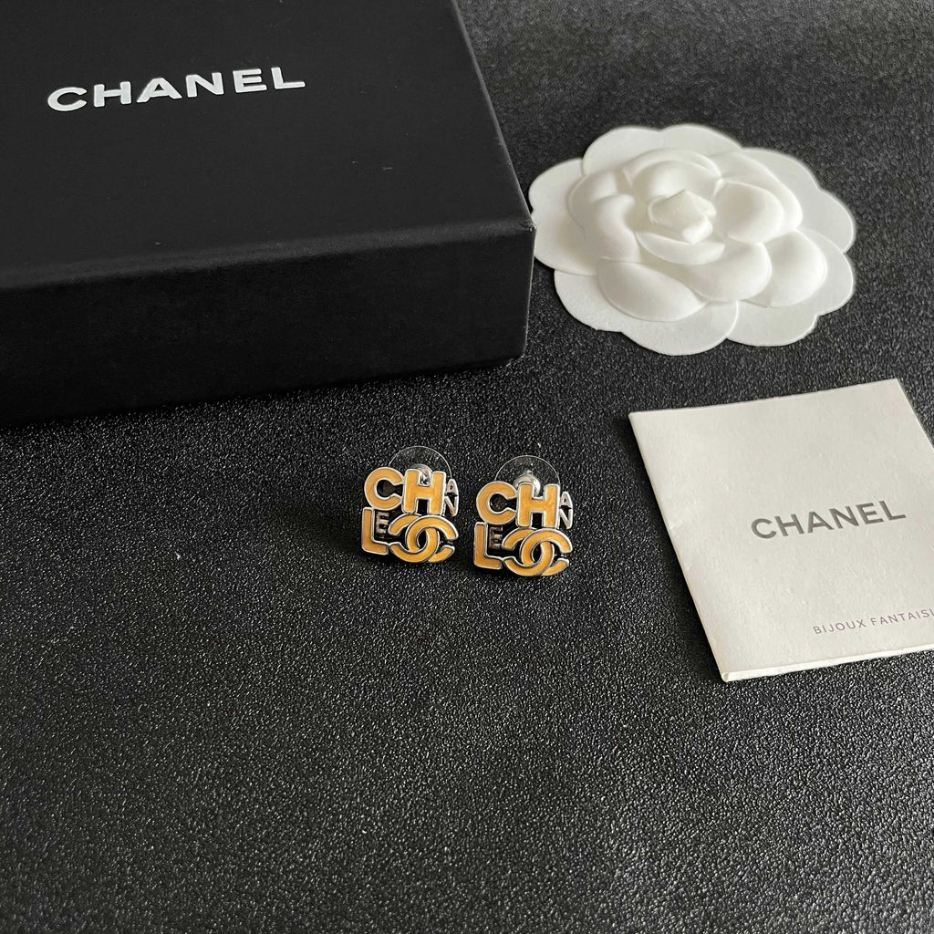 Double-C Emblem Stud Earrings in Polished Metal-Tone – Design 212 styled product view