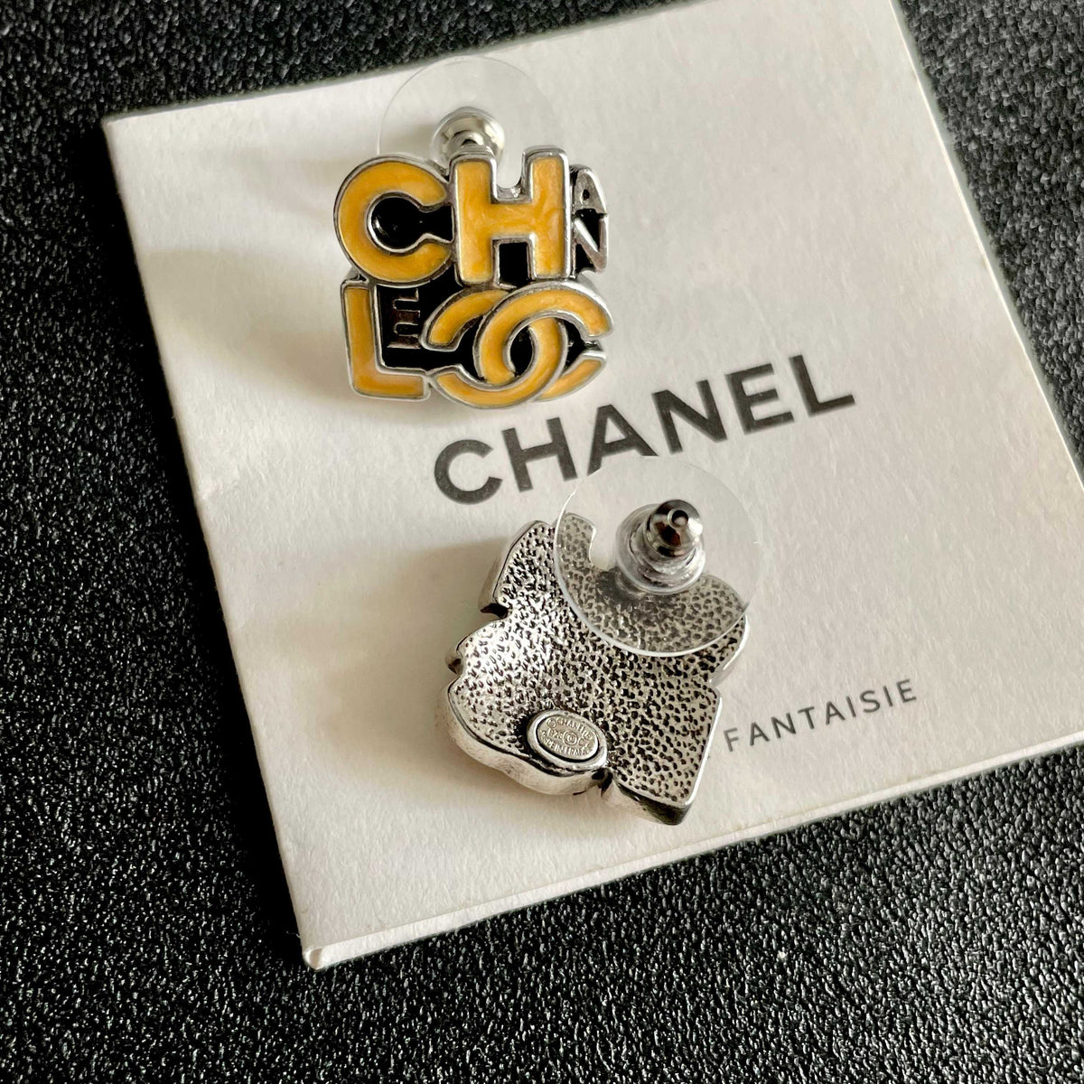 Double-C Emblem Stud Earrings in Polished Metal-Tone – Design 212 main product view