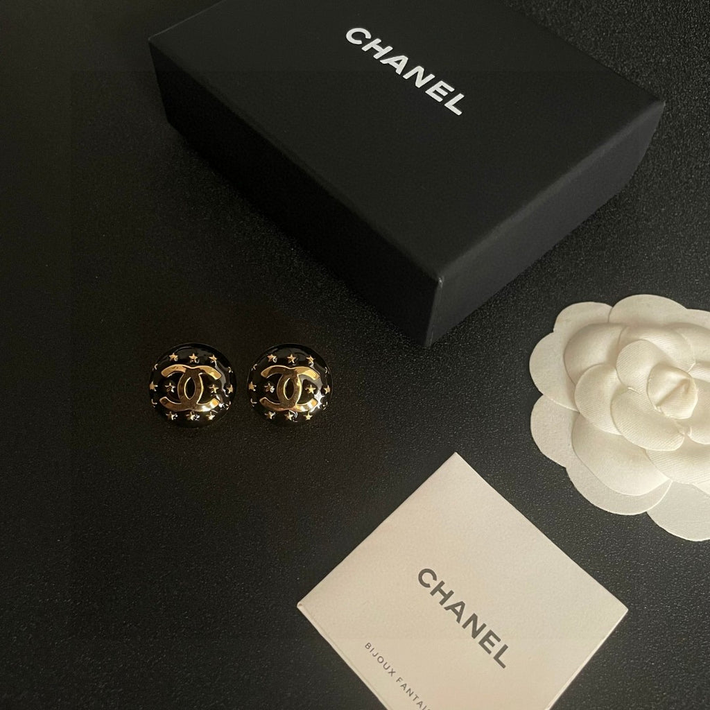 Double-C Emblem Stud Earrings in Polished Metal-Tone – Star Detail – Design 018 close-up detail