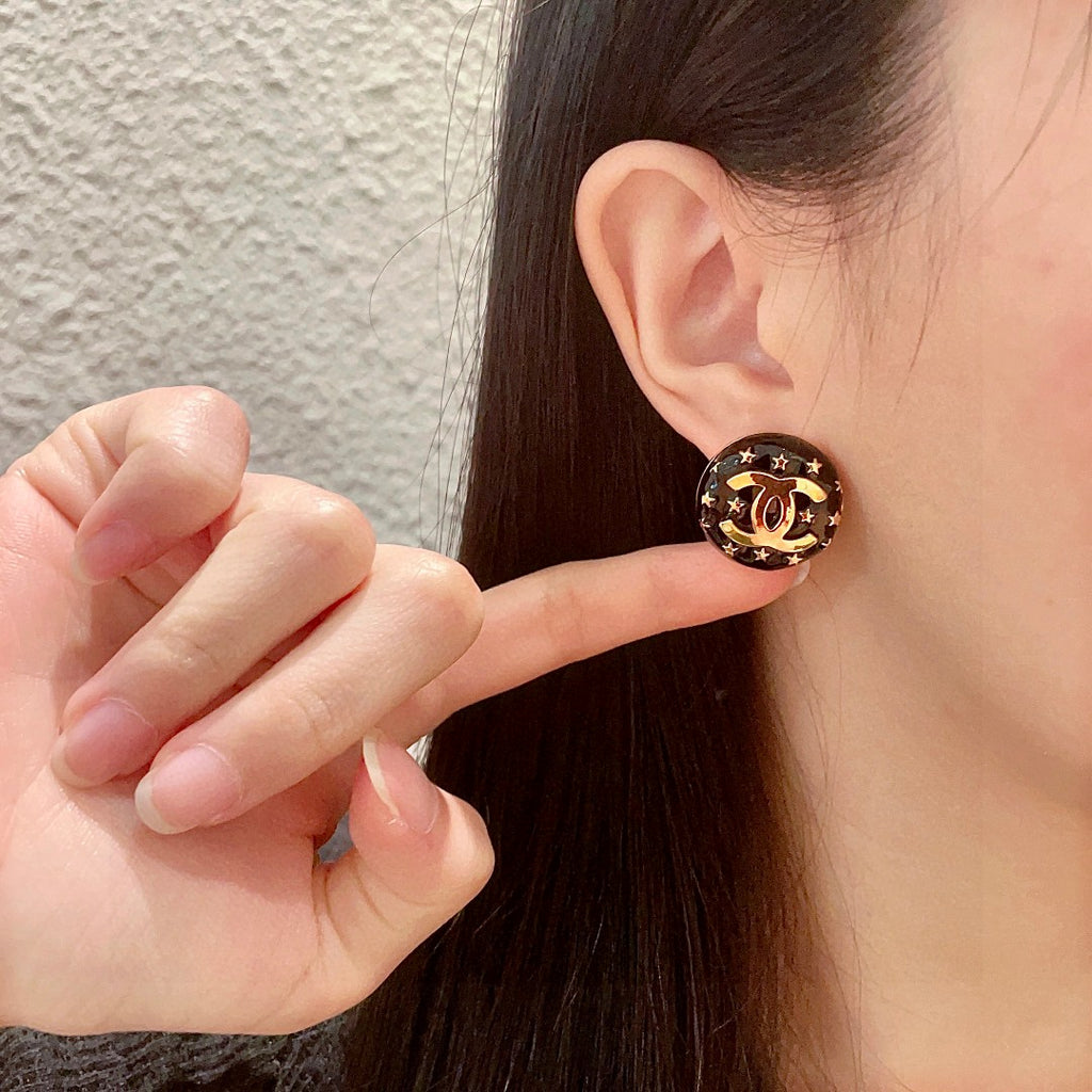 Double-C Emblem Stud Earrings in Polished Metal-Tone – Star Detail – Design 018 front product view