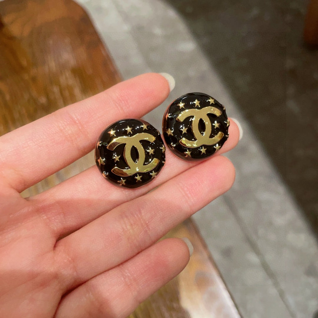 Double-C Emblem Stud Earrings in Polished Metal-Tone – Star Detail – Design 018 side detail