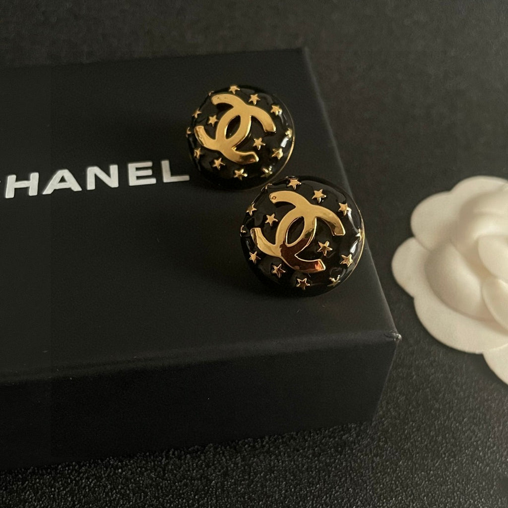 Double-C Emblem Stud Earrings in Polished Metal-Tone – Star Detail – Design 014 detail view